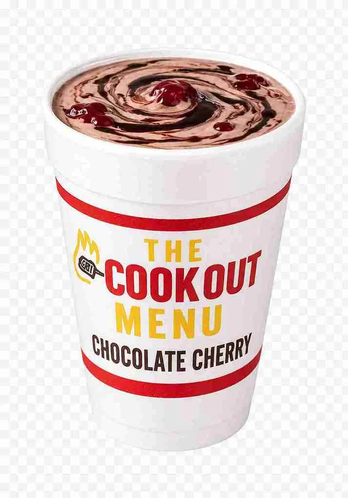 Cookout Menu 2026 with Prices: Tray Guide, 40+ Milkshakes & Every Item 17 **Alt text:**
Cookout chocolate cherry milkshake topped with whipped cream and cherry flavor blending in a creamy dessert drink.