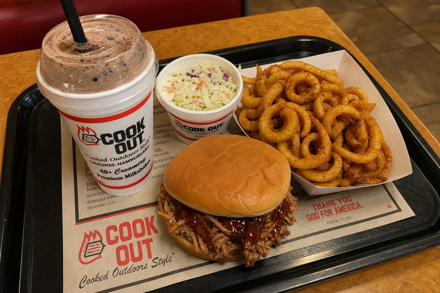 Cook Out BBQ Sandwich 2026: Price, Calories, Ingredients & How It Compares 3 cookout bbq sandwich tray combo with fries, coleslaw, and milkshake